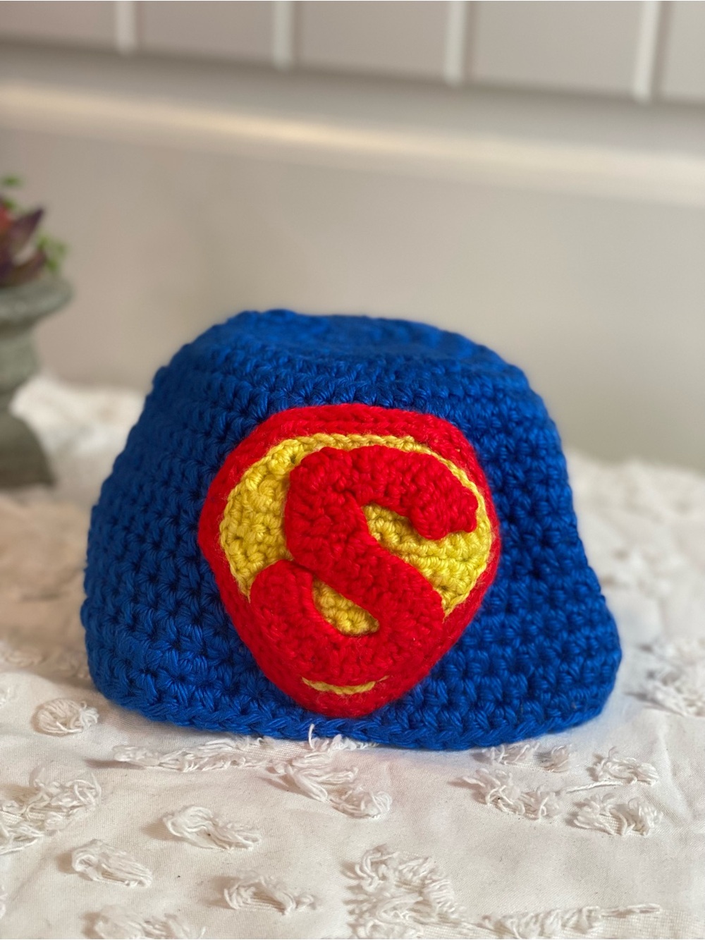 Handmade Blue Kids Crochet Superhero Hat with Red & Yellow Emblem